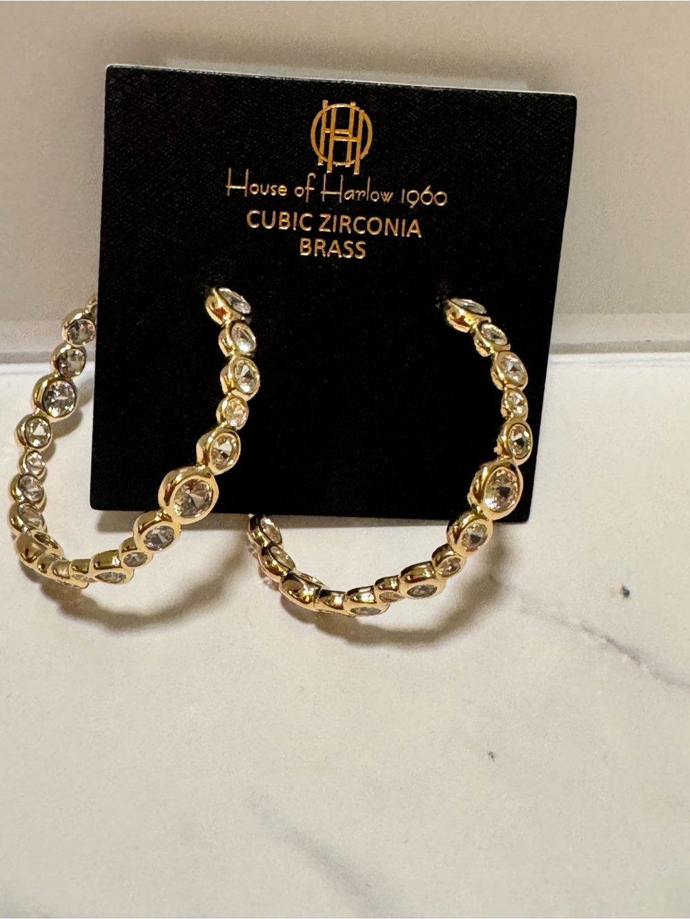 House of Harlow earrings and piper bracelet